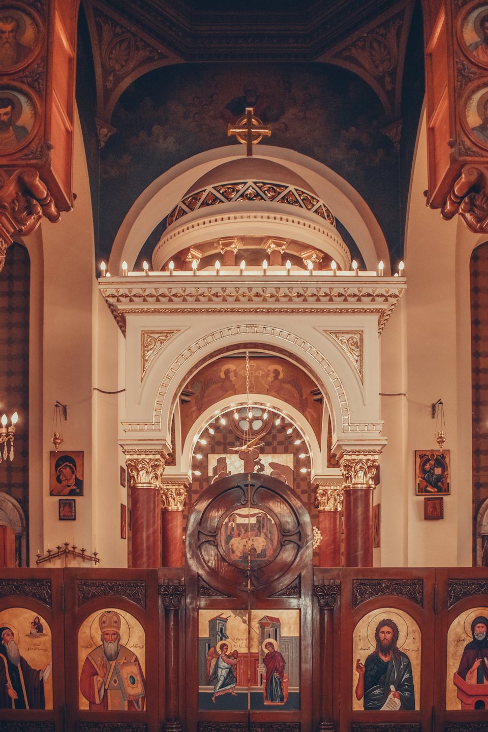 Ornate golden iconostasis inside an Orthodox church.